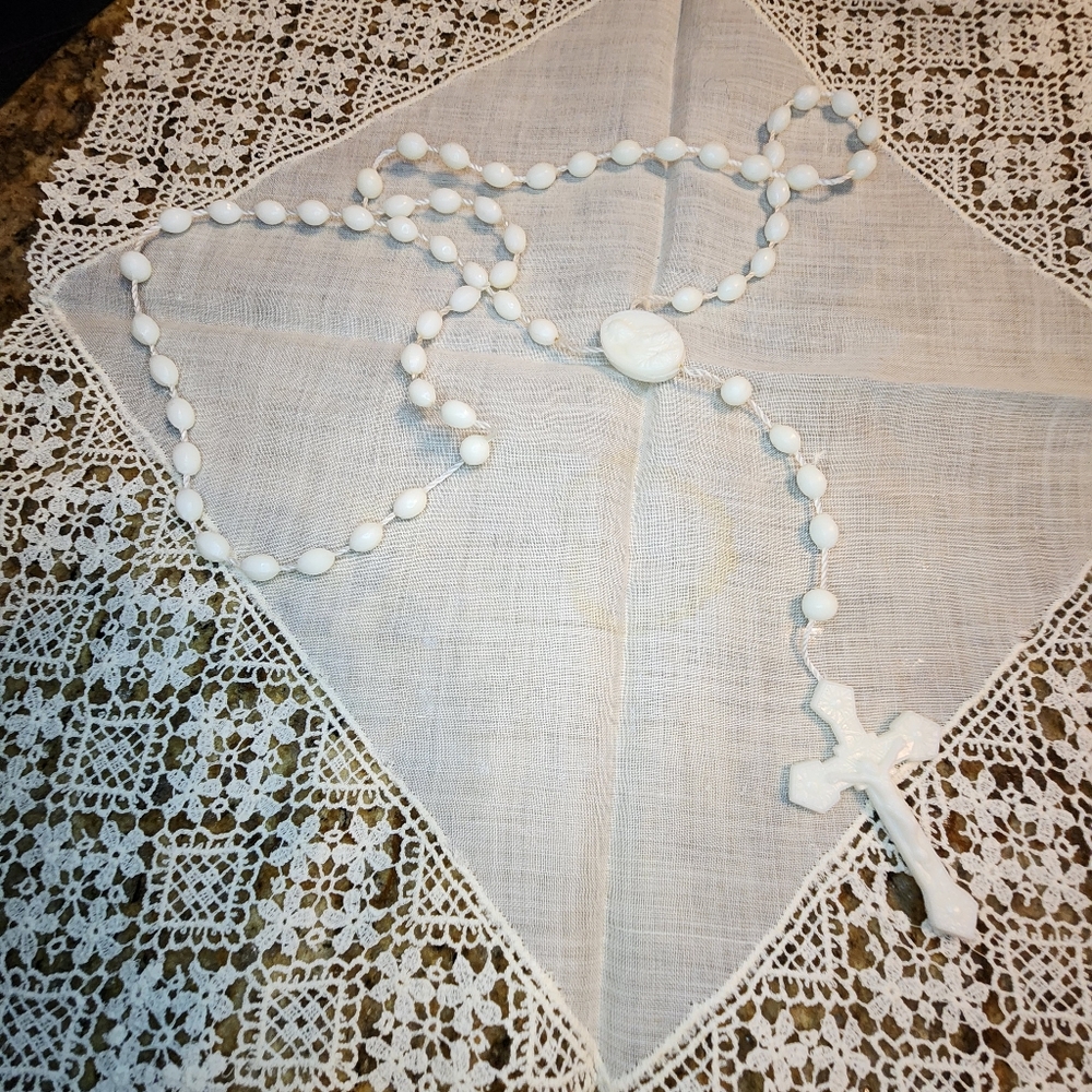 A Vintage White Plastic Children's Rosary